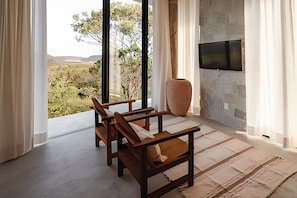 Bungalow | Living area | 50-inch Smart TV with digital channels