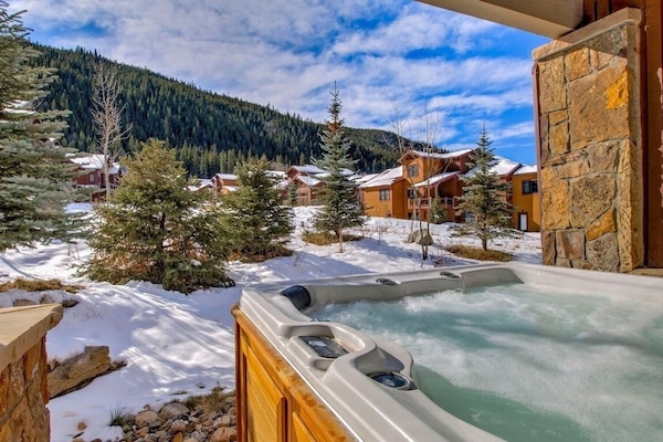 Enjoy the mountain views from your private hot tub