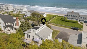 A coastal residential area with houses, a beach, and a clear view of the ocean. - Drakes Island! Ocean Views!- Across from Drake's Island Beach! (Wells)