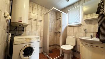 Douche, sĂšche-cheveux