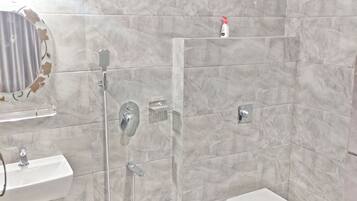 Hair dryer, towels, soap, shampoo