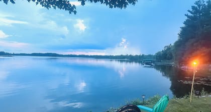 NEW LISTING! Spacious 4-bedrooms lake front retreat in delightful Alpena area.