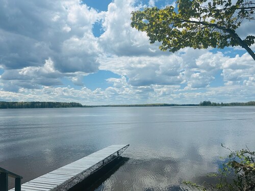 NEW LISTING! Spacious 4-bedrooms lake front retreat in delightful Alpena area.