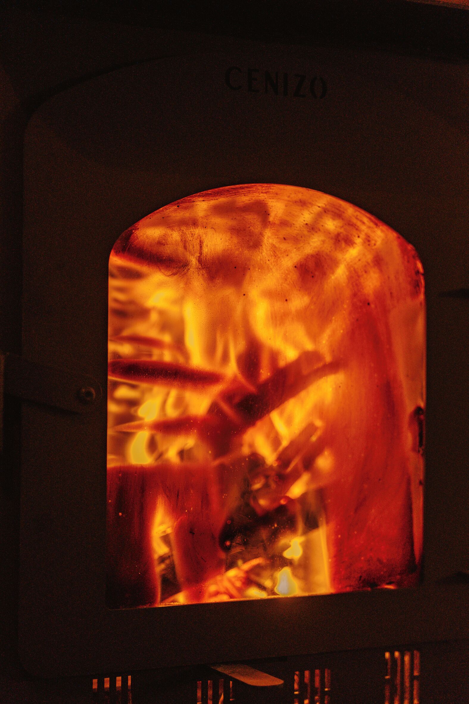 A pizza oven with the brand name "CENIZO" visible on the front.