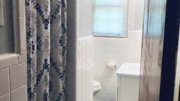 Hair dryer, towels, soap, toilet paper