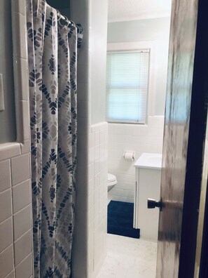 Hair dryer, towels, soap, toilet paper