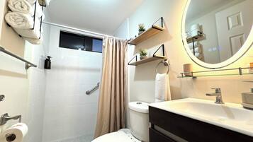 Shower, hair dryer, towels, soap