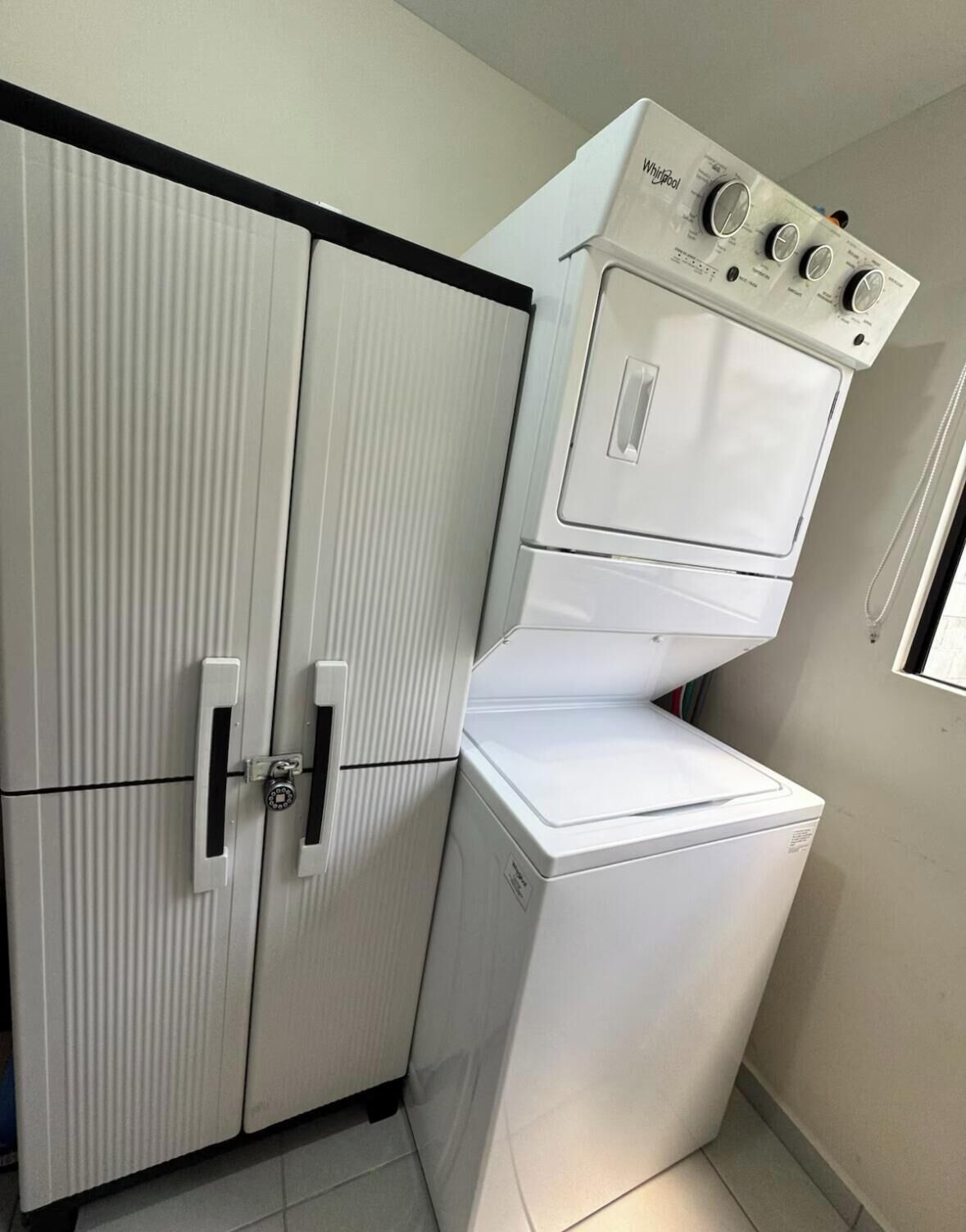 A laundry area with a washing machine and a drying machine.