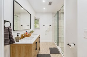 Shower, hair dryer, towels, soap