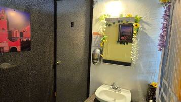Shower, towels, soap, toilet paper