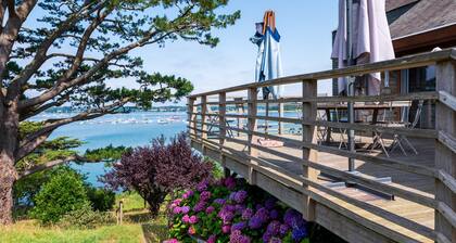 Villa 'Bienvenue Au Paradis' avec vue sur mer, terrasse privée et jardin privé