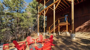 A wooden cabin with a deck, outdoor seating, and a fire pit. - Shem Shack (Big Bear City)