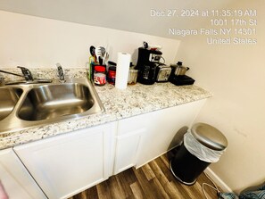 Microondas, horno y placa de cocina