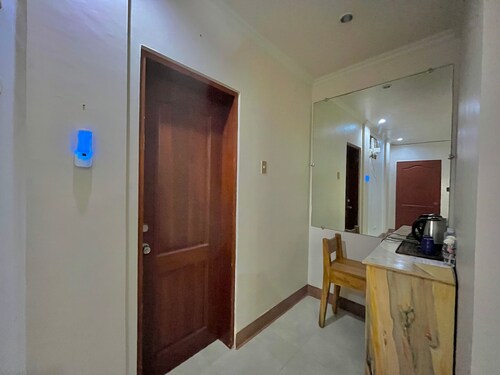 A peaceful beachfront resort with a home-like feel offering sea views.