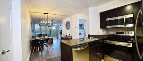 Economy Studio Suite | Private kitchen | Coffee/tea maker, electric kettle, toaster, paper towels