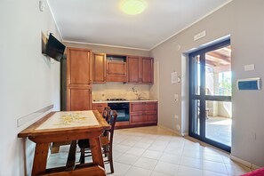 Fridge, stovetop, cookware/dishes/utensils