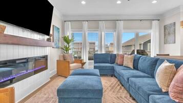 Älytelevisio, takka, videopelejä, kirjoja