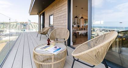 The Pepperpot is a detached, four bedroomed seafront retreat with a games room, with incredible view