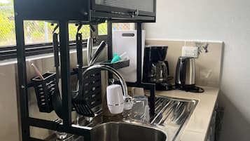 Een magnetron, een oven, een kookplaat
