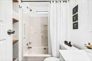 Hair dryer, towels, soap, shampoo
