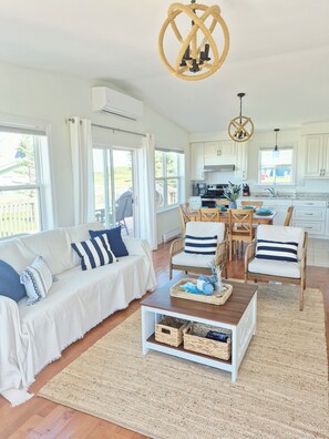 TV, fireplace - The Cape Islander: Seaside Cottage with Bunkhouse in Serene Sea View (Prince Edward Island)