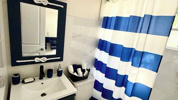 Hair dryer, towels, soap, toilet paper