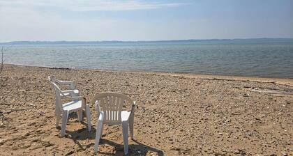 Rustic A-Frame Retreat on Grand Traverse Bay w/ beach, wifi, fire pit & grill