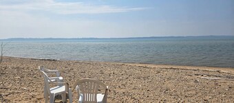 Rustic A-Frame Retreat on Grand Traverse Bay w/ beach, wifi, fire pit & grill