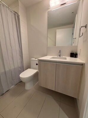 Hair dryer, towels, soap, shampoo