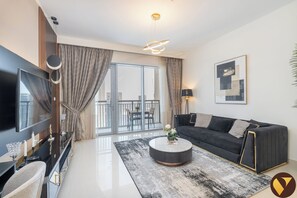 Luxury Apartment, City View | Living area | 55-inch Smart TV with cable channels - Dubai Creek Harbour  41st Floor Skyline (Dubai)