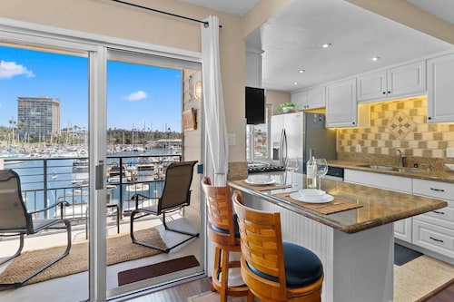 302B Amazing Location! Gorgeous Marina Views! Steps from Top Rated Harbor Beach