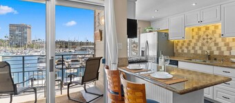 302B Amazing Location! Gorgeous Marina Views! Steps from Top Rated Harbor Beach