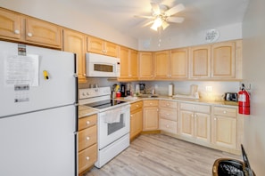 Fridge, microwave, stovetop, coffee/tea maker