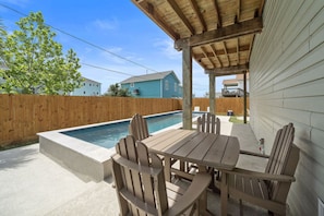 Outdoor dining - Cozy Beach House with Game Room, Steps from Beach (Galveston)