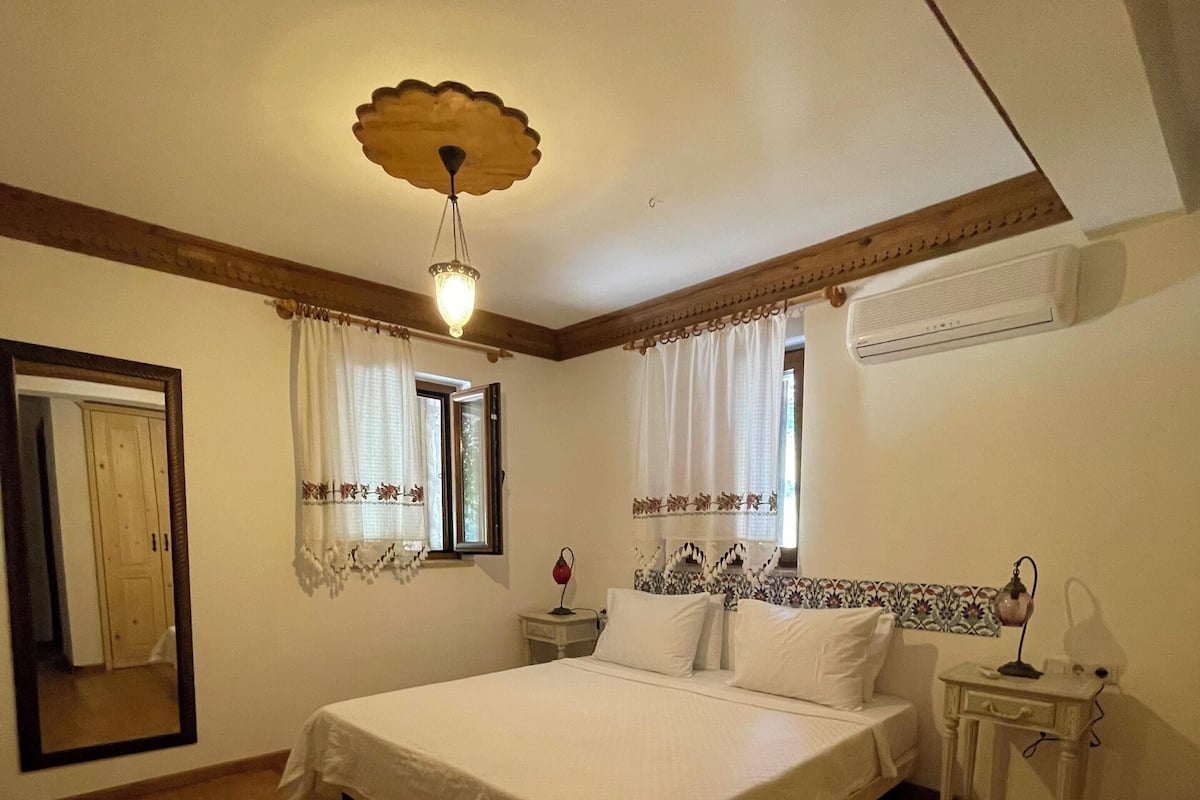 Deluxe Quadruple Room, Garden View | Premium bedding, minibar, free cots/infant beds, free WiFi