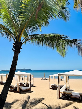 On the beach, white sand, beach bar, surfing