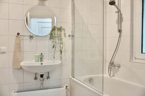 Hair dryer, towels, soap, toilet paper