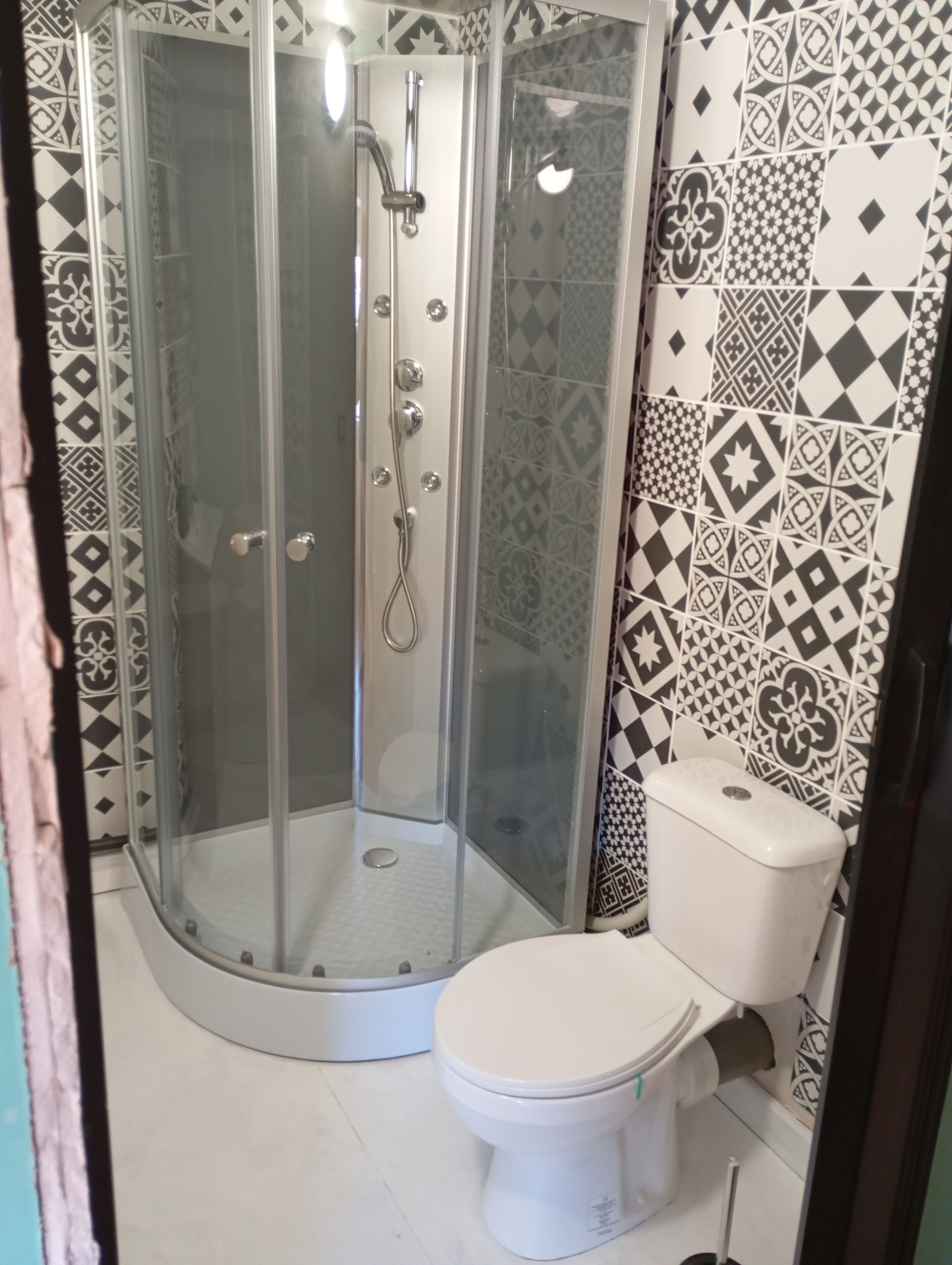 Ducha, toallas, jabón y champú