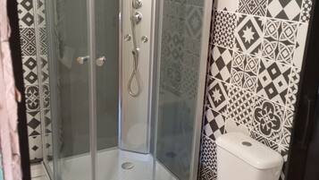 Shower, towels, soap, shampoo