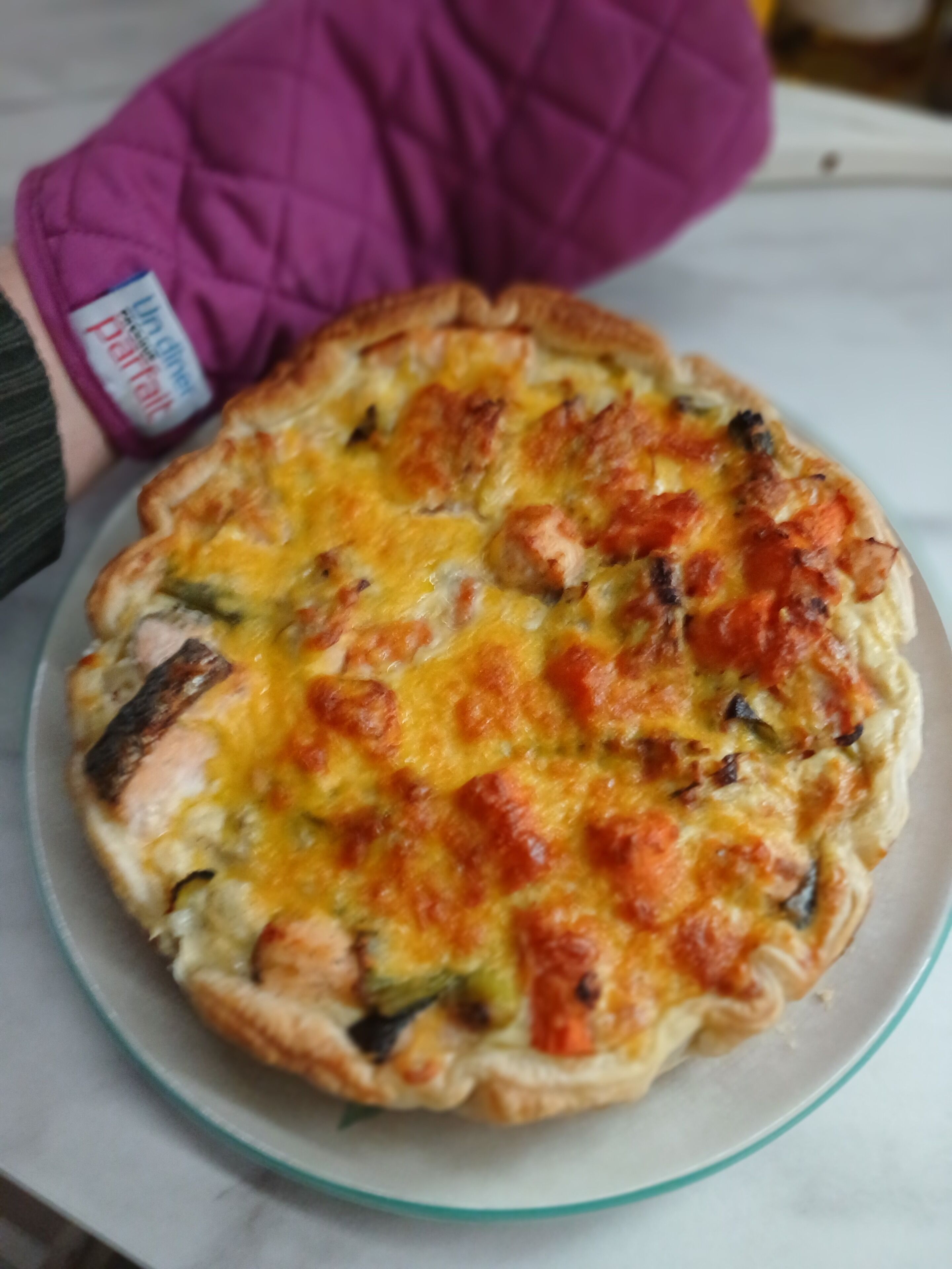 A pizza on a plate.