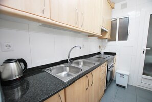 Fridge, microwave, oven, coffee/tea maker