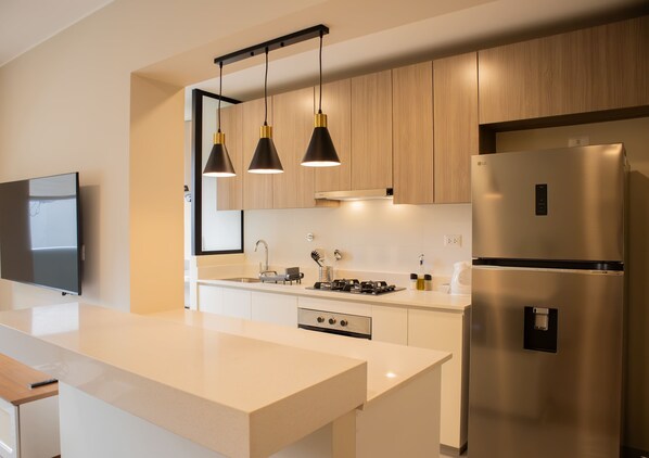 Fridge, microwave, oven, stovetop