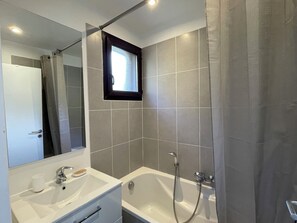 Shower, towels, toilet paper