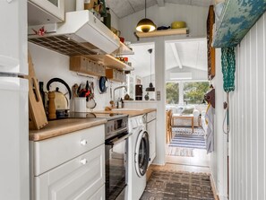 Fridge, microwave, cookware/dishes/utensils
