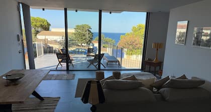 Architect-designed villa - 4 waterfront suites with private pool