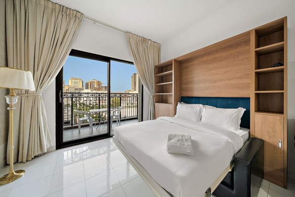 Iron/ironing board, travel crib, free WiFi, bed sheets