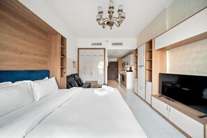 Iron/ironing board, travel crib, free WiFi, bed sheets