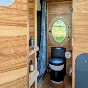 Shower, eco-friendly toiletries, towels, soap