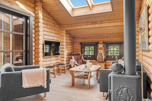 Well-maintained log house with hot tub, sauna and covered terrace in Thy.