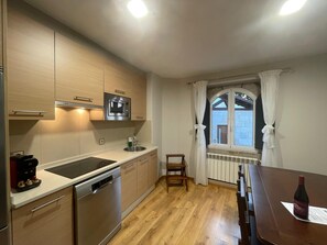 Apartment, 2 Bedrooms | Private kitchen | Fridge, microwave, stovetop, dishwasher